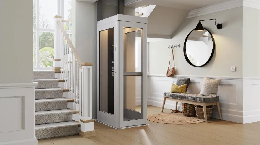 a home elevator next to a staircase