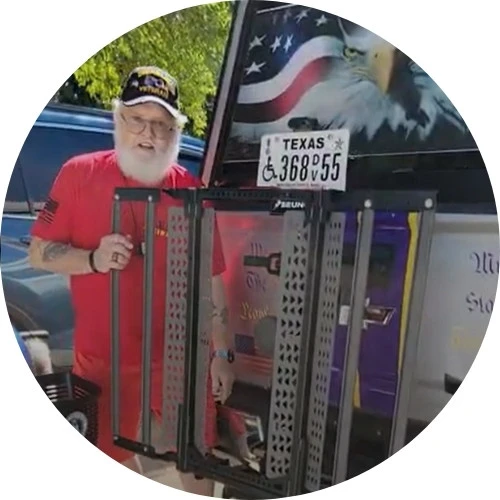 a man standing next to a scooter lift