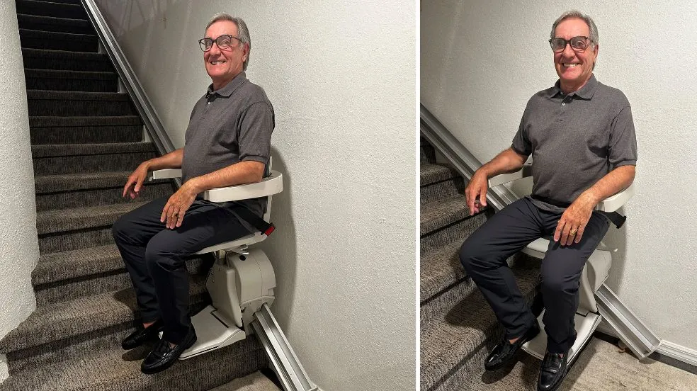 a man riding an indoor stair lift